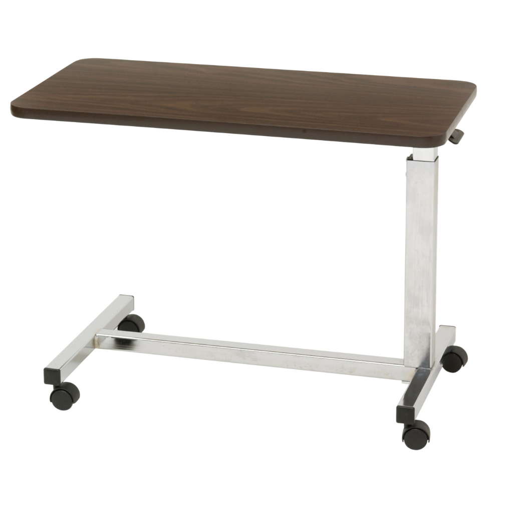 Drive Medical low height overbed table with adjustable surface and sturdy base, designed for convenient bedside use.