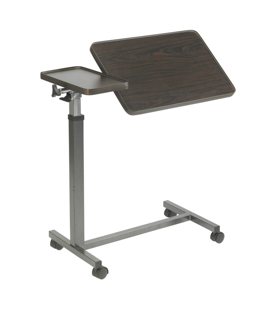 Drive Medical tilt-top split overbed table with adjustable height and sturdy surface for convenient bedside use.