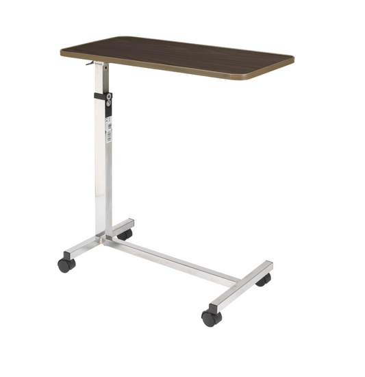 Drive Medical tilt top overbed table with adjustable height and sturdy surface for convenient bedside use.