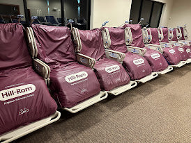 Hill Rom P7500 Progressa hospital bed with air mattress, without percussion feature, in a clinical setting.