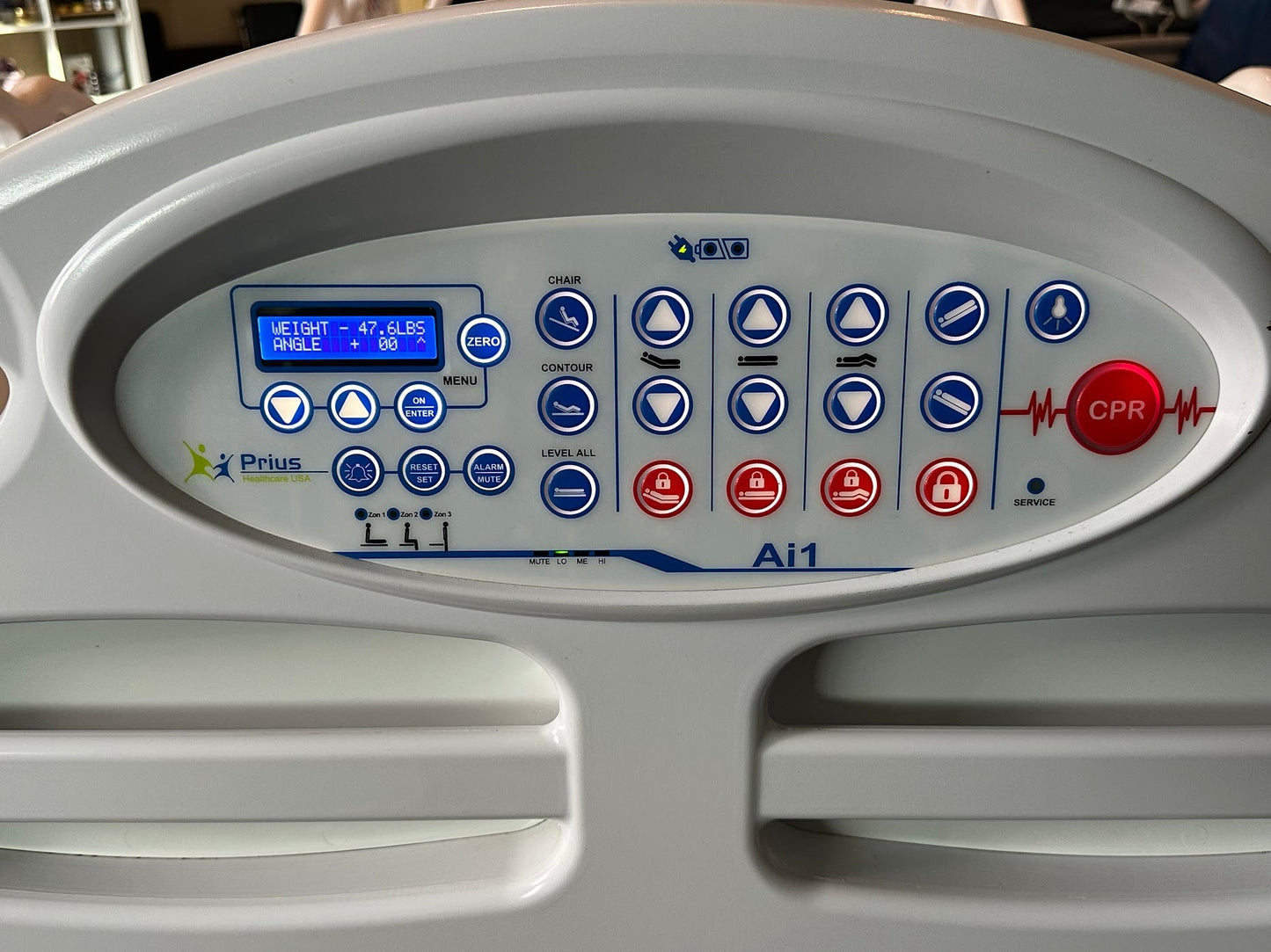 Prius Ai1 bariatric hospital bed with high and low adjustable positions, extra wide design, suitable for medical care settings.