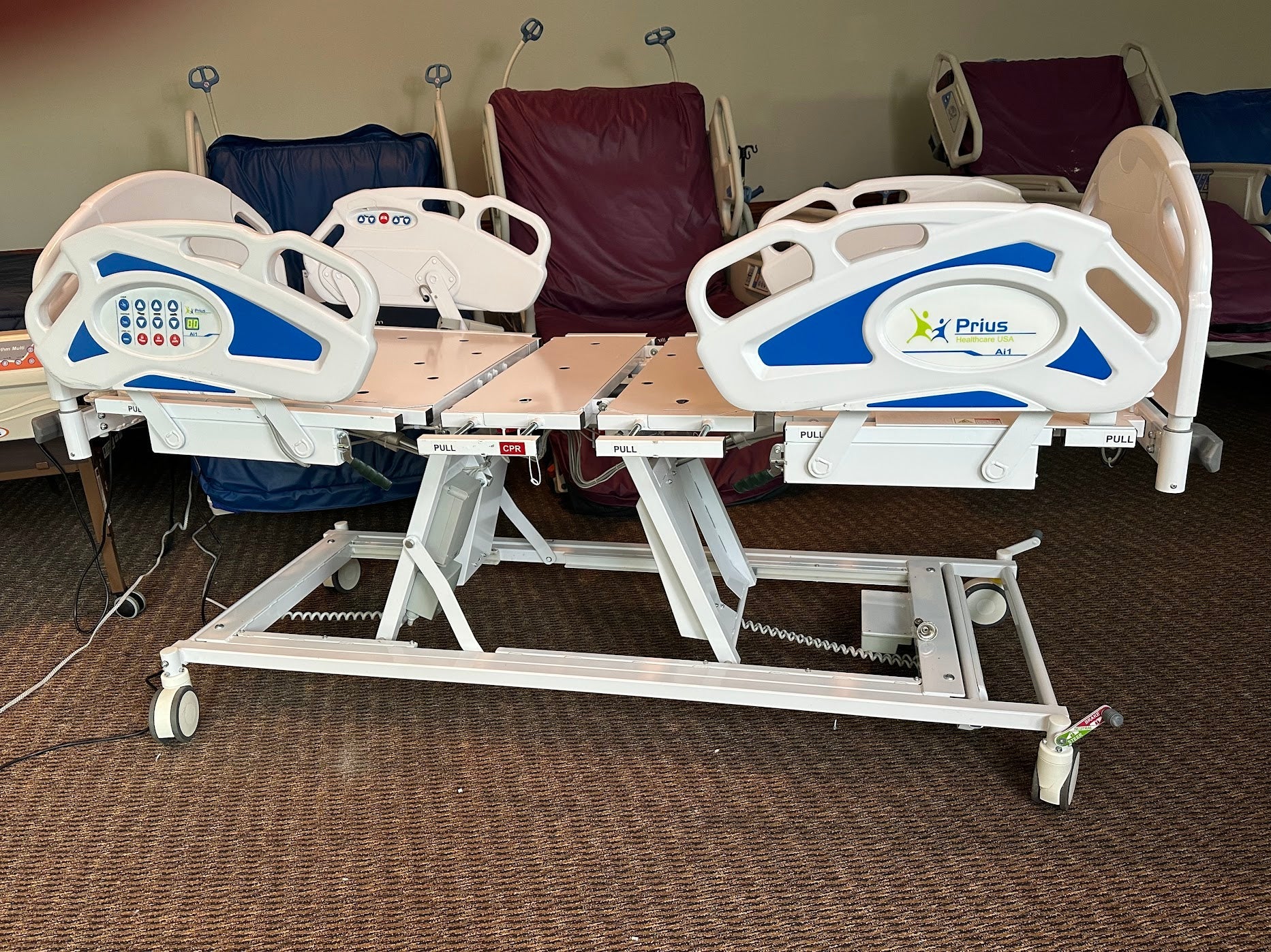 Prius Ai1 bariatric hospital bed with adjustable high-low and extra-wide design for patient comfort and safety.